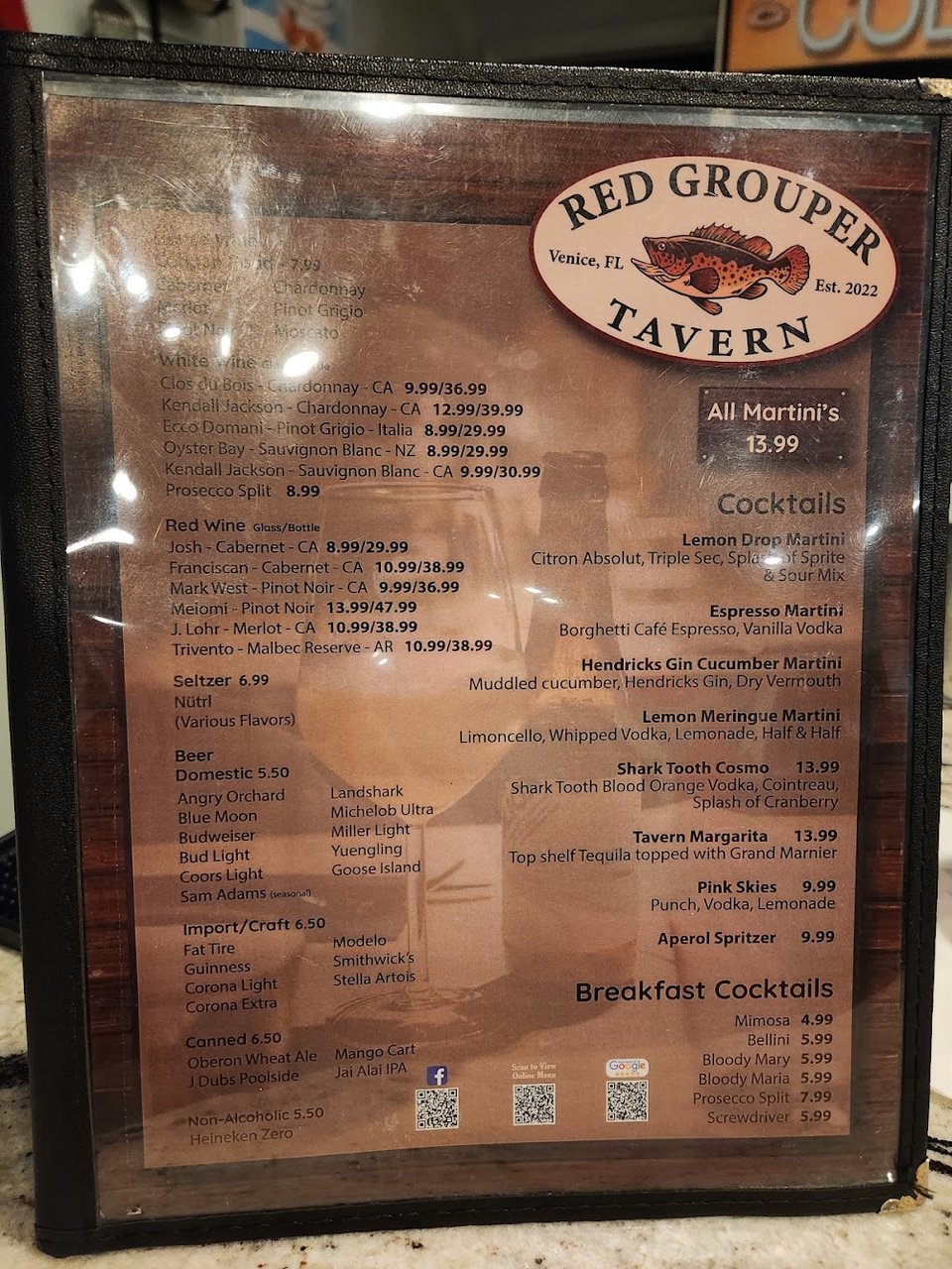 Printed menu for seafood, sandwiches, and pasta.